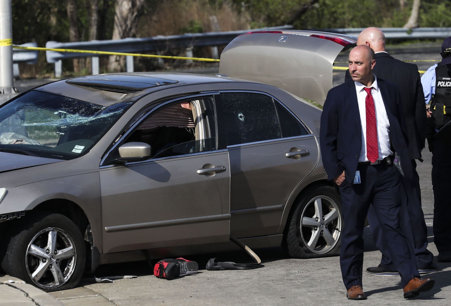 Car wreck follows shooting in North St. Louis